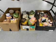 Three boxes of novelty lidded cookie jars and tea pots