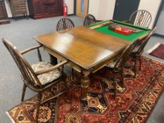 An oak snooker dining table, by Riley Limited, Ackrington, together with oak score board, five cues,