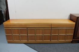A twentieth century Mackintosh furniture three door sideboard base