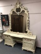 A classical style gilded cream mirrored dressing table,