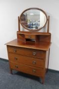 An Edwardian mahogany dressing chest