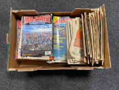 A box of military modelling magazines, 1980's comics including Dandy, Buster,
