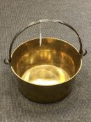 A heavy gauge brass jam pan