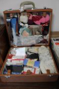 A mid 20th century Cheney case of haberdashery items