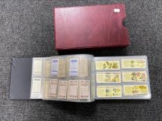 An album of antique and later postcards and cigarette cards - cricketers,