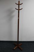 A mid 20th century teak hat and coat stand
