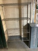 A wire metal four tier shelving unit