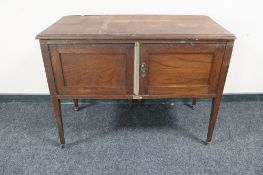 An Edwardian oak wash stand