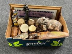 A box of tribal figures, wall masks, miniature hand drum,