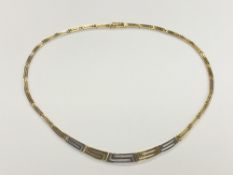 An 18ct gold two-tone necklace CONDITION REPORT: 19.