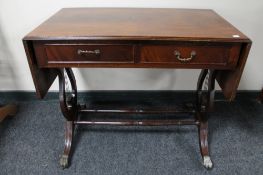 A Regency style flap sided sofa table