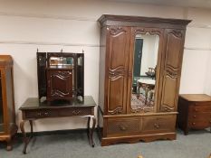 A late Victorian mahogany mirror door wardrobe, width 141 cm, with matching mirrored dressing table,