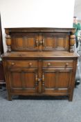 An Ercol buffet backed sideboard