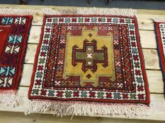 A fringed Caucasian mat,