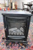 A By Flame electric fire in the form of a stove