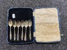 A case of set of five silver teaspoons together with one other teaspoon