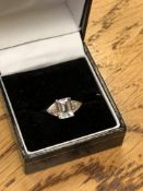 A 10ct gold aquamarine and diamond ring,