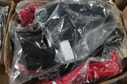 A box of Phaze frill bow skirts,