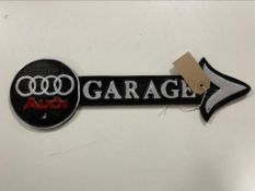 A cast iron plaque - Audi garage