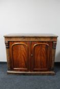 A Victorian mahogany double door sideboard