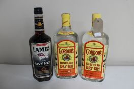 Two bottles of Gordon's Distilled Dry Gin 1l together with a bottle of Lamb's Navy Rum 750ml (2)