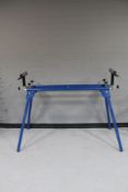 A folding mitre saw stand