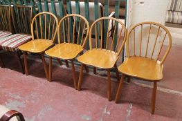 A set of four beech kitchen chairs