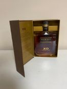 A bottle of Monnet Cognac XO Prestige 700ml,