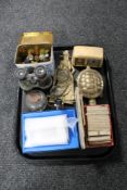 A tray of vintage marbles, tea cards, brass ware, field glasses,