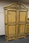 A Barker & Stonehouse pine double door wardrobe,