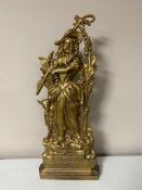 An antique cast iron Little Bo Peep door stop,