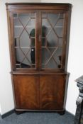 A Regency style corner display cabinet