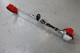 A petrol garden strimmer