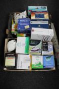 A box and a crate of assorted electricals, kettles, irons, light bulbs, Britta filter,