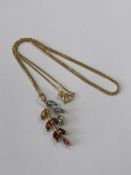 A 9ct gold gem-set floral pendant on chain, 3.1g gross.