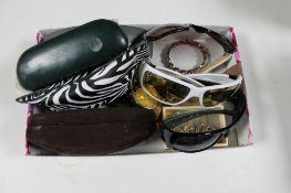 A box of costume jewellery, wristwatches,