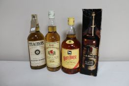 Four bottles of alcohol; Teacher's Scotch Whisky 26 fl. oz.
