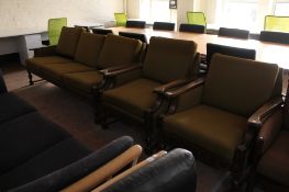 A twentieth century Danish oak framed three piece suite