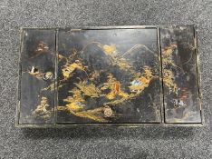 A Japanese lacquered and mother of pearl inlaid table box