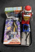 A tray of vintage toys, tin plated talking robot, robotic radio by Harvard,