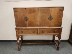 A good quality oak cocktail sideboard,