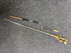 An antique court sword with etched blade,