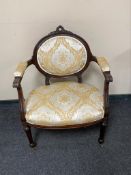 A reproduction mahogany armchair,