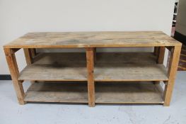 A pine three tier work bench, 60.5 cm deep. 184 cm wide and 77 cm height.