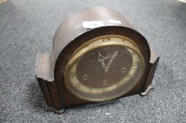 An oak cased Art Deco mantel clock