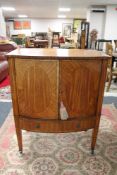 An inlaid mahogany double door TV cabinet