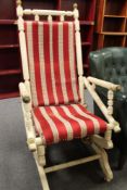 An American style white painted rocking chair
