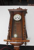 A Victorian mahogany wall clock