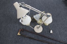 A metal angle poised lamp and three further lamps