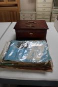 A wooden jewellery box with key together with a quantity of sheet music